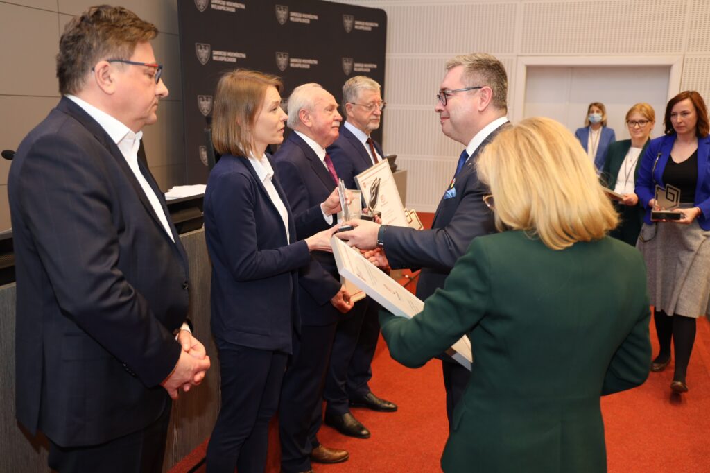 genxone representatives during award ceremony